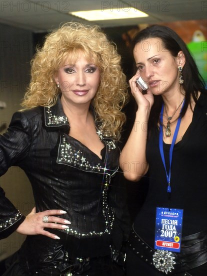 Singer irina allegrova with daughter lala (r) at the olympiysky sports complex, moscow, russia, december 9, 2007.