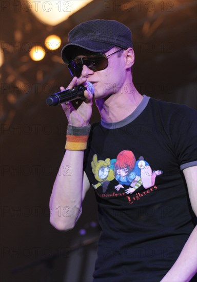 Vocalist of the ukrainian hip-hop band bumboks andriy hlyvnuk performs at the international rock festival maxidrom-2008 in the olympiysky sports complex,  june 14, 2008.
