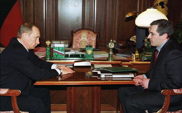 President vladimir putin (l) pictured during the meeting with board chairman of the yukos oil company mikhail khodorkovsky in the kremlin on thursday, during the talks they discussed some problems of business in russia and the dialogue on energy between russia and the european union, march 14, 2002.