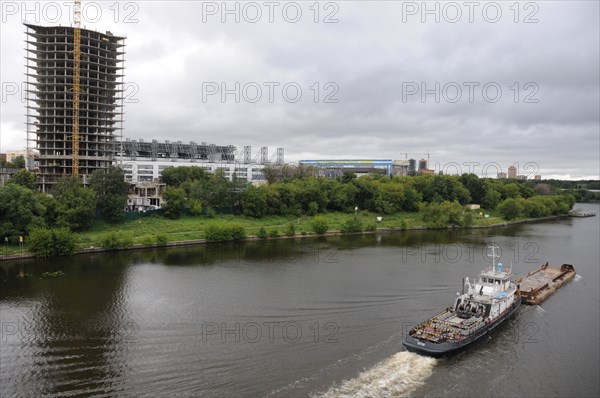 A view of the arena-khimki football stadium across the moscow river, moscow region, august 2008.