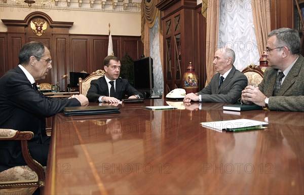 Russian foreign minister sergei lavrov, russian president dmitry medvedev, and newly-appointed ambassadors to south ossetia and abkhazia, elbrus kargiyev and semyon grigoryev, respectively, (l to r) during a meeting in moscow's kremlin, october 24, 2008.