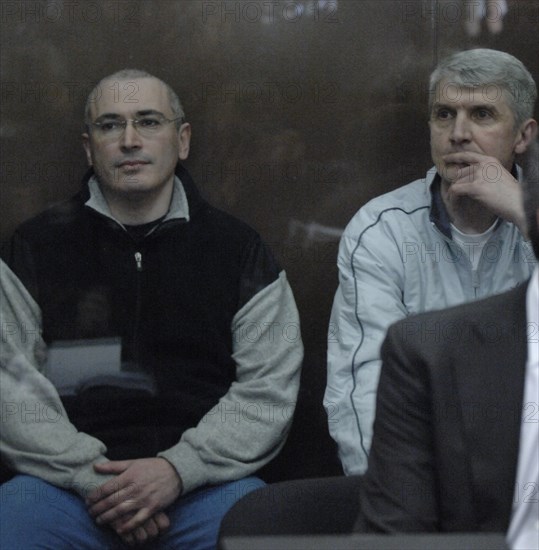 Moscow, russia, march 3, 2009, former yukos head mikhail khodorkovsky (l), and former head of menatep group, platon lebedev, appear at moscow's khamovniki district court on new charges of embezzlement and money laundering.