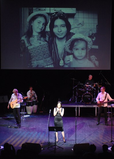 Moscow, russia, march 13, 2009, singer dilnaz akhmadiyeva performs at a concert in memory of singer murat nasyrov 'his story,,' at the moscow international performance arts center.