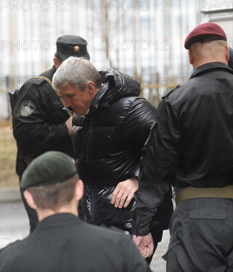 Moscow, russia, march 31, 2009, former menatep head platon lebedev escorted to khamovniki district court on the charges of stealing 892bn rubles ($ 26bn) worth of oil produced by yukos daughter companies (samaraneftegaz, yuganskneftegaz, tomskneft vnk).
