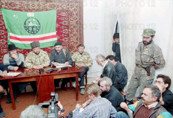 Chechen republic, dudayev's field commanders /left to right/ akhmed zakayev, commander of south-west front of chechen resistant forces uslan gelayev, chief of head quaters of south-west front isa astamirov and commander of southern direction of south-west front daud akhmadov threat russia at the press-conference held in the village of urus-martan these days, october 23, 1995.