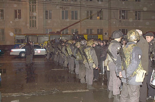 Moscow, russia, october 24, 2002, squads of special troops pictured cordoning off the area near the palace of culture seized by terrorists on wednesday evening, people, who had come to watch the musical play nord-ost, were taken hostages there, omon and sobr anti-riot police units surrounded the place now.