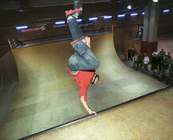 A rollerblader demonstrates his skill , the largest skate park in europe was opened in medvedkovo district of moscow, the park named 'adrenaline' has over 75,000sq ft of specially arranged space for skateboard and rollerskating fans, december 14, 2002.