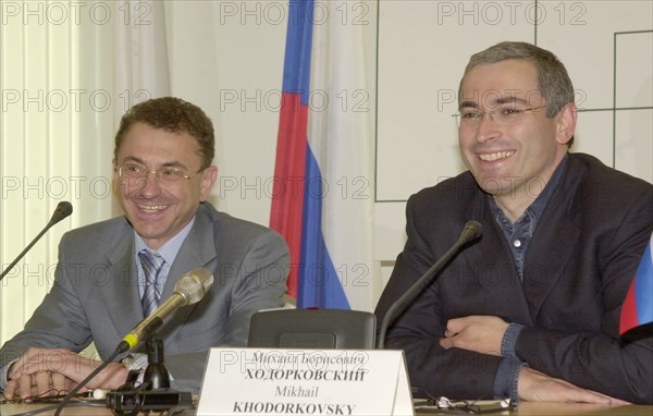 Moscow, russia, june 18, 2003, new chairman of the directors ' board of the yukos oil company semen kukes (l) and chairman of the directors' board of the yukos- moscow company mikhail khodorkovsky pictured during a press-conference on wednesday.