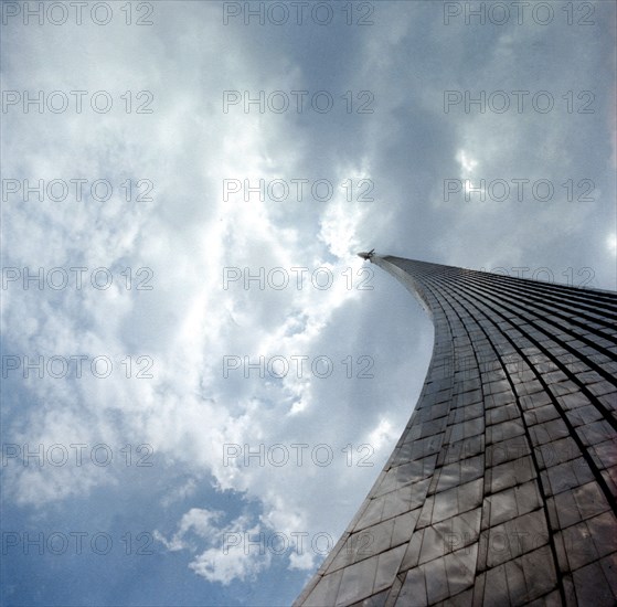 The space obelisk, memorial to soviet conquerors of space, at vdnh exhibition center, moscow, russia.