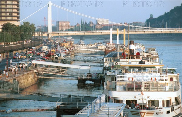 Tour boats on the bank of the danube river, budapest, hungary.