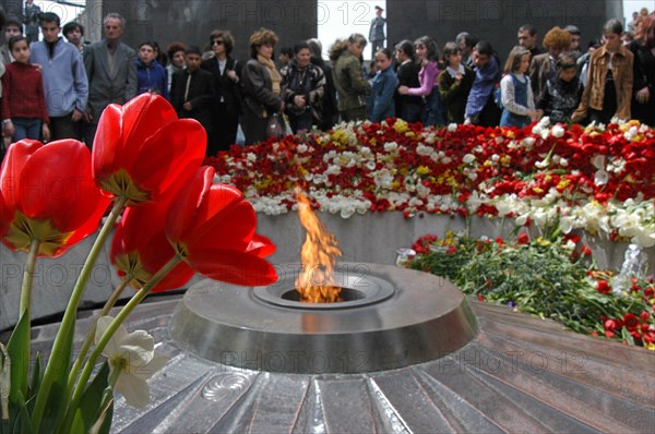 The day of memory of the victims of the 1915 genocide of armenians by the ottoman empire is being marked friday in armenia and in all the armenian communities of the world,thousands of people with flowers come to the eternal flame, a memorial to the victims of genocide, 4/24/03.