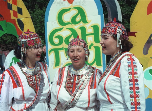 Chuvash, singers from chuvashia, guests at the celebration of the popular tatar holiday sabantui are shown singing, in izmaylovo park, moscow, russia, 7/99, 'sabantui', as translated from the tatar language, means 'the holiday of the plough' and marks the end of spring sowing.