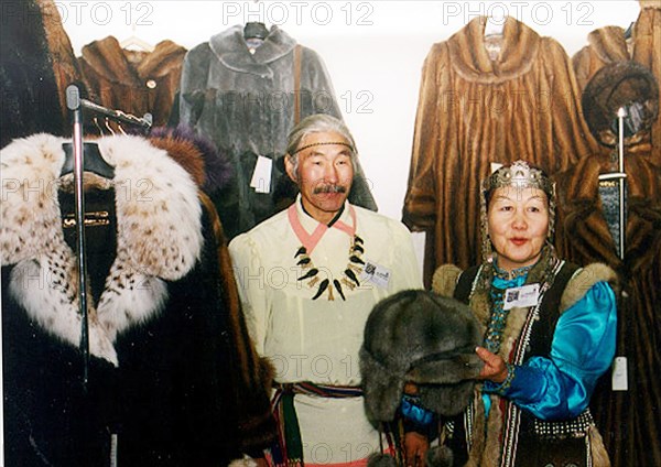 Khabarovsk, far east, russia 2003: the picture shows vasily and valentina aglasov demonstrating products of the yakut fur producing center named ytyk-haya at the amur commercial and industrial fair, photo itar-tass.