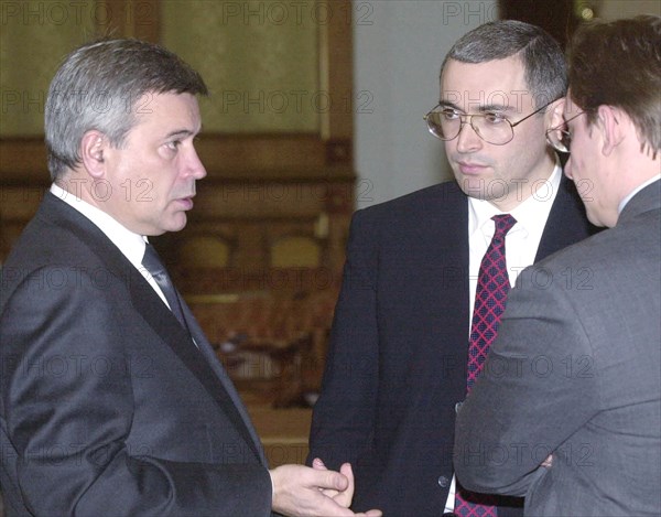 Lukoil chief vagit alikperov, left, and yukos board chairman mikhail khodorkovsky, center, attending a special conference chaired by russian premier mikhail kasyanov in moscow on wednesday, the situation in the country's oil industry was discussed at the conference, moscow, russia, december 13, 2000.