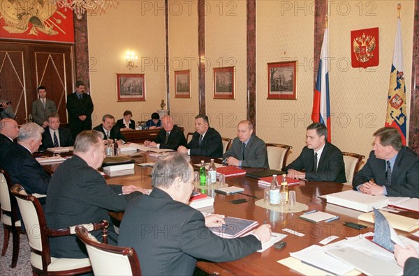 Kremlin, moscow, russian federation, january 30 2002: russia`s president vladimir putin (second right) at a meeting of the presidium of the state council that discussed on tuesday the main directions of the land reform and the key provisions of the draft land code.