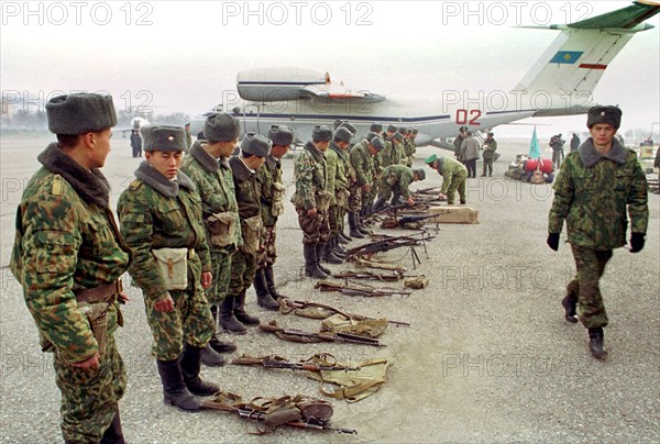 Tajikistan, february 4, 2001, kazakh battalion pictured at the dushanbe airport prior to their departure for homeland, on sunday, the unit of kazakh border guards have ended their peacekeeping mission on guarding jointly with the russian border guards one of the sectors of the tajik-afghani border, since 1993 the kazakh battalion has lost over 20 servicemen, who were killed in fights with tajik and afghani mojaheds.