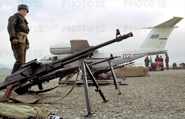 Tajikistan, february 4, 2001, kazakh battalion pictured at the dushanbe airport prior to their departure for homeland, on sunday, the unit of kazakh border guards have ended their peacekeeping mission on guarding jointly with the russian border guards one of the sectors of the tajik-afghani border, since 1993 the kazakh battalion has lost over 20 servicemen, who were killed in fights with tajik and afghani mojaheds.