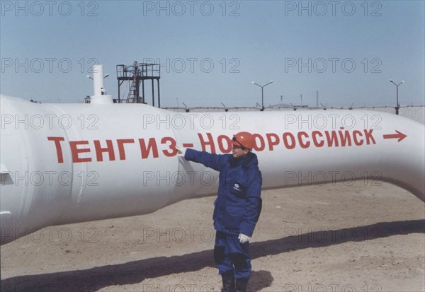 Kazakhstan, march 27 2001- picture shows the 'tengiz-black sea' oil pipeline during the opening ceremony at atyrau as the caspian pipeline consortium (ktk) on monday started pumping oil into the pipeline running from tengiz oil field in kazakhstan to the russian black sea port of novorossllsk, the oil is expected to reach the terminal by june 2001, according to the ktk press service, it will take some 90 days and a million tons of oil to fill the 1,580-km-long pipeline.