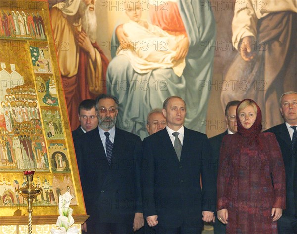 Russian president vladimir putin, his wife lyudmila, and state duma vice-speaker artur chilingarov attending the overnight easter mass at the christ the saviour cathedral on the night from saturday to sunday, april 15, 2001.