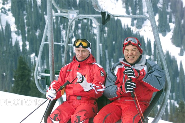 Kazakhstan, march 2 2002 russian president vladimir putin (l) and his kazakh counterpart nursultan nazarbayev pictured on an elevator as they take rest following an informal summit of the cis leaders, in chimbulak, a mountain ski resort in kazakhstan, on saturday,  sergei velichkin  02,03,2002 .