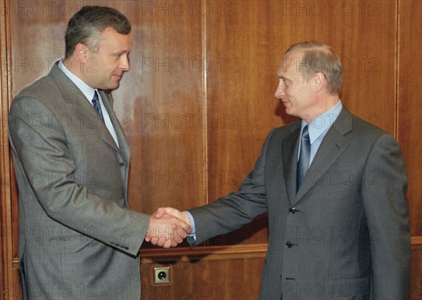 Head of the national reserve bank, alexander lebedev meeting with vladimir putin, may 7, 2002.