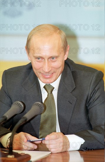 Moscow, russia, june 20, 2003, president vladimir putin (in pic) at his meeting with finalists of a contest to create the presidential website, members of the jury and the site's authors, in the kremlin today, the new website opens today.