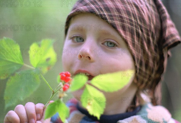 A child, indian summer in the southern urals,chelyabinsk region, russia.
