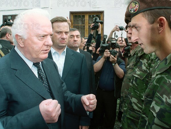 Georgia 8/27/02: georgian president eduard shevardnadze (l) visited the pankiyskoye gorge august 27, where he met with local residents and servicemen of the georian ministry of internal affairs.