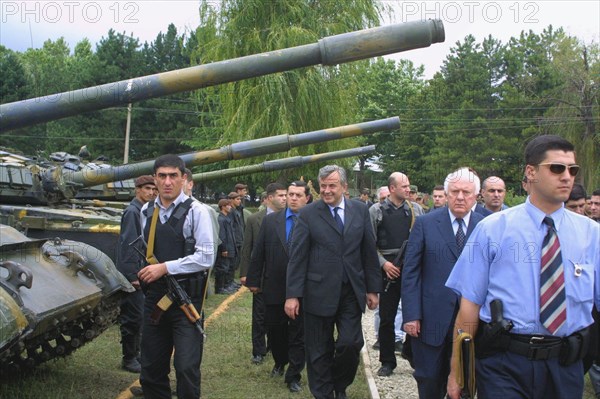 Georgia, 8/02: georgian president eduard shevardnadze meeting with local residents and georgian interior servicemen during his visit to the pankiyskoye gorge august 27.