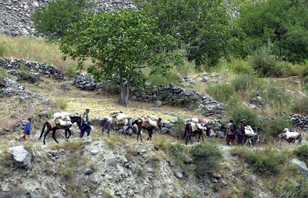 Russian border guards of kalaikhumb command, tajikistan, october 14, 2002, dwellers of nusai settlement (in pic) came close to the border seeking shelter from intensified military operations on afghan side of the frontier line,russian border guards of kalaikhumb command were put on alert, they closely follow the development of the situation.