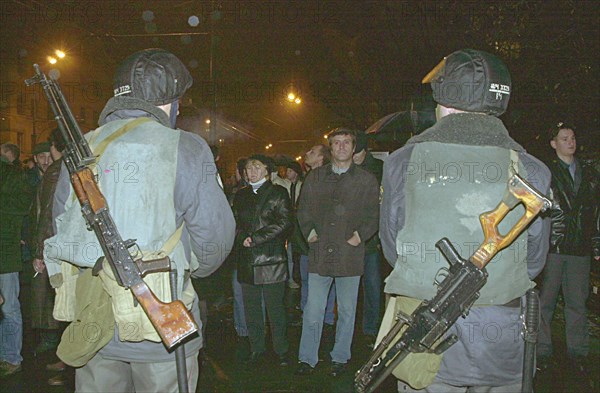 Moscow, russia, 10/24/02: squads of special troops pictured cordoning off the area near the palace of culture seized by terrorists on wednesday evening, people, who had come to watch the musical play nordt-ost, were taken hostages there, omon and sobr anti-riot police units surrounded the place now.