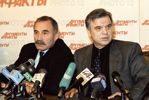 Moscow, russia, october 25, 2002: aslanbek aslakhanov (l) , a state duma deputy from chechnya and a famous representative of the chechen community in moscow ruslan khasbulatov (r) pictured during a new conference on the moscow hostage crisis.