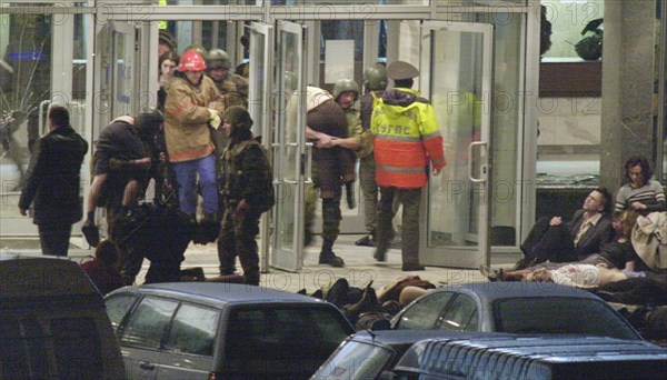Moscow, russia,10/26/02, chechen hostage crisis: special forces personnel carry out the hostages, barayev and 35 terrorists including those with explosives attached to their bodies, were killed, the hostages are free.
