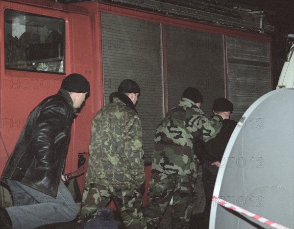 Moscow, russia, october 26 2002: chechen hostage crisis: an arrested terrorist (r), in the course of the operation to release the hostages 34 terrorists were killed, two arrested.