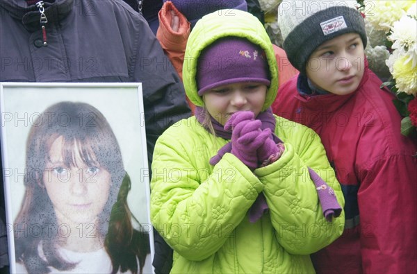 Moscow, russia, october 30 2002: funerals of soloists of the nord-ost musical kristina kurbatova and arseniy kurilenko who perished in terrorist attack against the dubrovka theatrical centre, the artistes were buried in vagankovo cemetery.