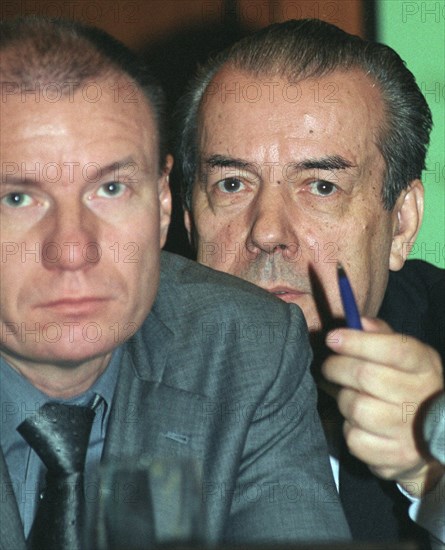 Arkady volsky chairman of the russian union of industrialists and enterpreneurs(r) vladimir potanin, head of the 'interros ' holding company, pictured in the conference hall of the balchug hotel during the second conference on the key problems of economy held here on wednesday, november 27, 2002.