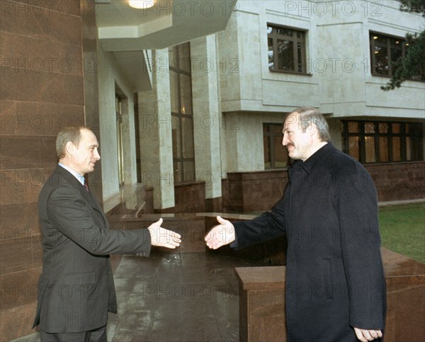 Moscow,russia, november 27 2002: russian president vladimir putin (l) pictured greeting his belarussian counterpart alexander lukashenko on wednesday at the volynskoye residence in a moscow suburb, (photo sergei velichkin).