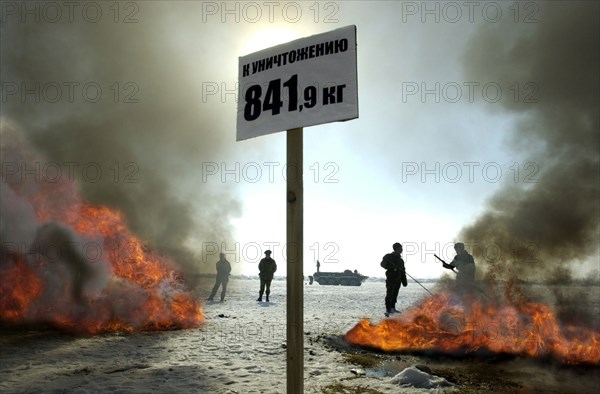 Tajikistan, december 6 2002: men of the moskovsky border detachment burning up packets containing the confiscated drugs with a total weight of 841,9 kilograms, on friday, the drugs were confiscated in the course of special operations held with the participation of over 300 servicemen, (photo itar-tass / sergei zhukov) .