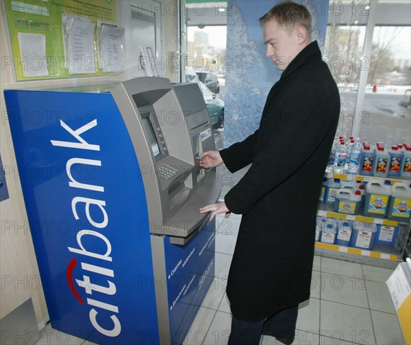 Russia, december 17 2002, one of automated teller machines of citibank installed on the premises of bp filling stations, besides dispensing cash the machines can manage any kind of non-cash money transfers.
