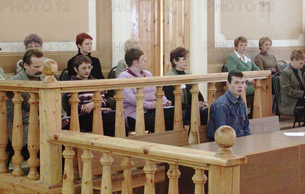 The first jury trial held in the nizhni novgorod regional court, yevgeny grigorov (front) stood charges of robbery and an attempted murder, the case was considered by the jury on his own request, nizhni novgorod, russia, january 28, 2003.