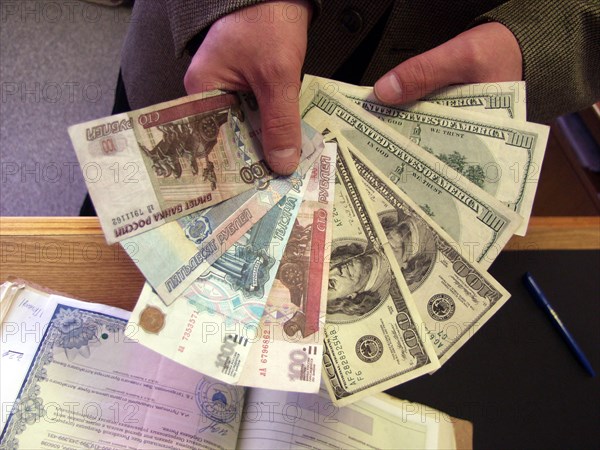 Barnaul, russia, february 18, 2001, a great number of forged banknotes were found by the law enforcement bodies in the altay territory this year .