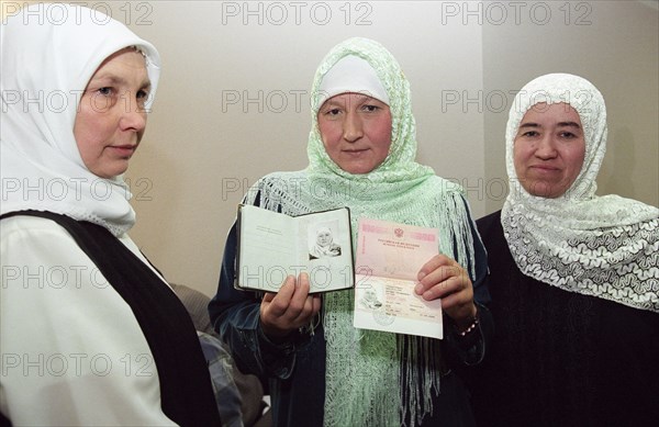 moscow,russia, march 5 2003, residents of nizhnevartovsk (l-r)  gulnur nuriyeva, fatima gabidullina and rosa latipova pictured at the russian supreme court