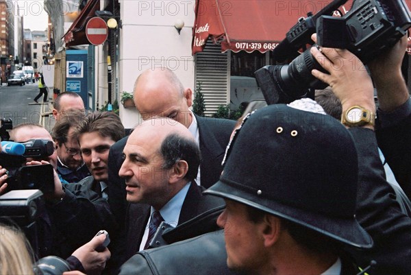 Russian business magnate boris berezovsky (c) answering journalists questions outside london's bow street magistrates court where hearing on his extradition and the extradition of yuli dubov took place on wednesday, london, uk, april 2, 2003.