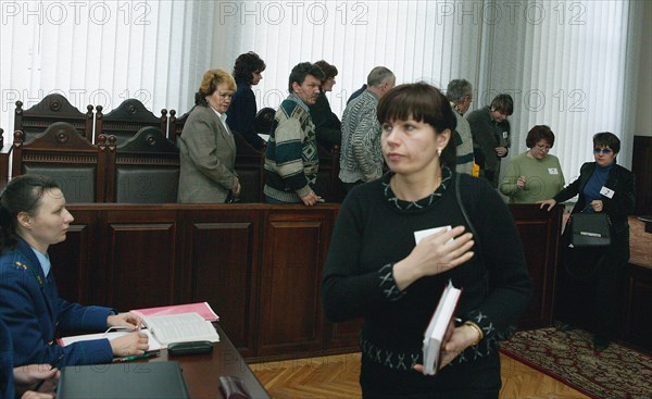 Jury members leaving the courtroom for deliberation after considering the case of polovin and yakimov, charged with a policeman's murder, at the kaliningrad regional court, here the case was considered with participation of jurors for the first time ever, april 14, 2003.