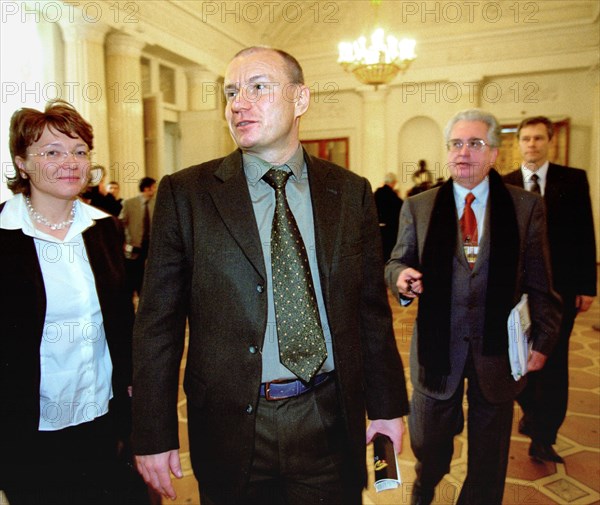 State hermitage director mikhail piotrovsky (r) and president of the interros company vladimir potanin (front) pictured following the latter's election as the chairman of board of trustees of state hermitage, the first meeting of the newly established council was held on saturday, 04/19/03.