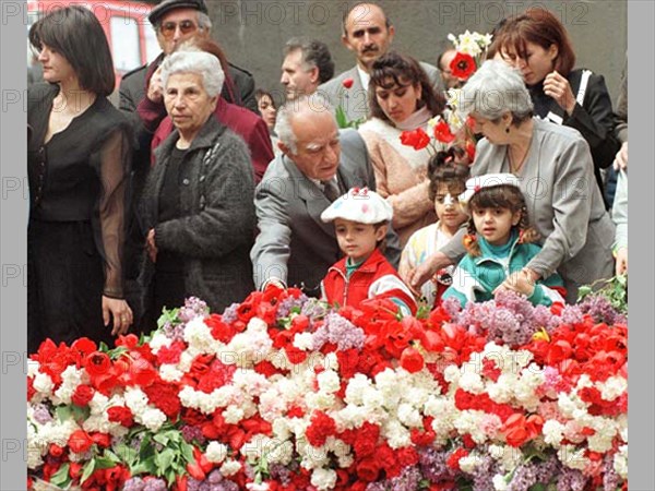 The day of memory of the victims of the 1915 genocide of armenians by the ottoman empire is being marked friday in armenia and in all the armenian communities of the world,thousands of people with flowers come to the eternal flame, a memorial to the victims of genocide, 4/23/98.