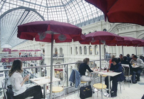 Gum department store marks its 110th anniversary, moscow, russia june 2003, restaurant on balcony.