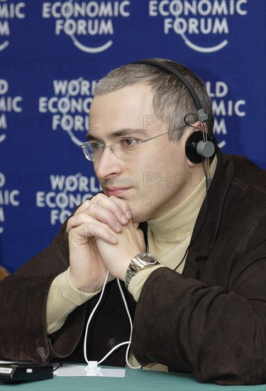 Yukos ceo mikhail khodorkovsky taking part in the work of moscow session of world economic forum on friday, where he declared that the unification of the two russian oil giants yukos and sibneft had been practically completed, us exxon mobil company expressed their intention to buy a 40% share of 'yukos-sibneft' for 25 billion dollars, moscow, russian, october 3, 2003.