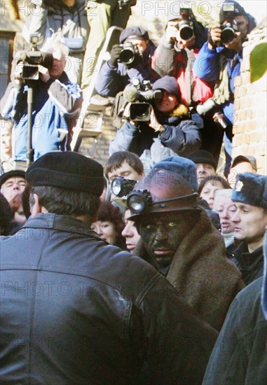 Rostov region, russia, october 29,2003, one of the miners (c) found in the blocked mine today, eleven miners out of 13 who spent 6 days in the blocked 'zapadnaya' mine were saved today.