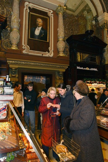 Shoppers return to the famous yeliseyevsky gourmet supermarket which reopened after renovations in central moscow on saturday, november 29, 2003.